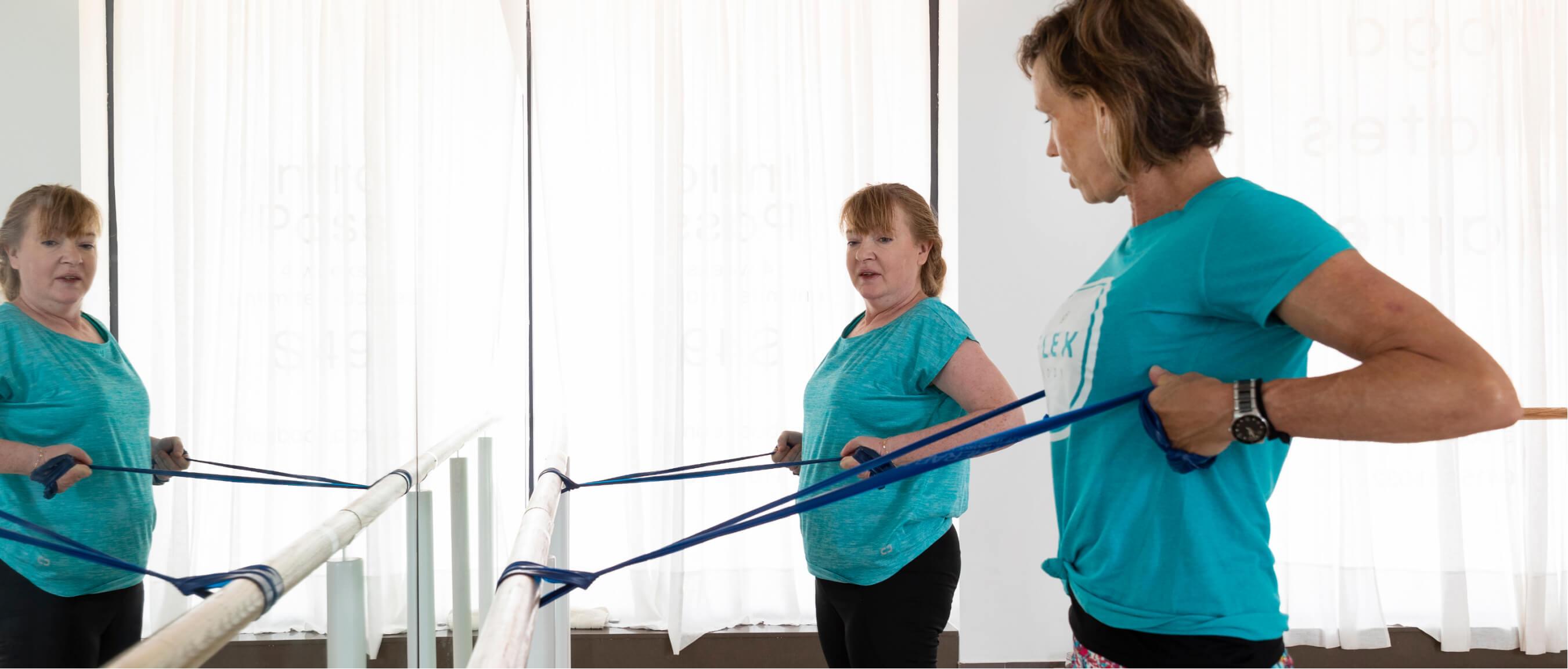 Rose exercising with her therapist Susan